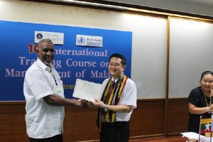 Head of Mahidol University Tropical Medicien handing over International certificate to SOYDA Doctor, in Thailand, 14th Sep 2012