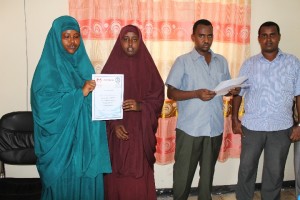 SOYDA Director Handing over certificate to SOYD